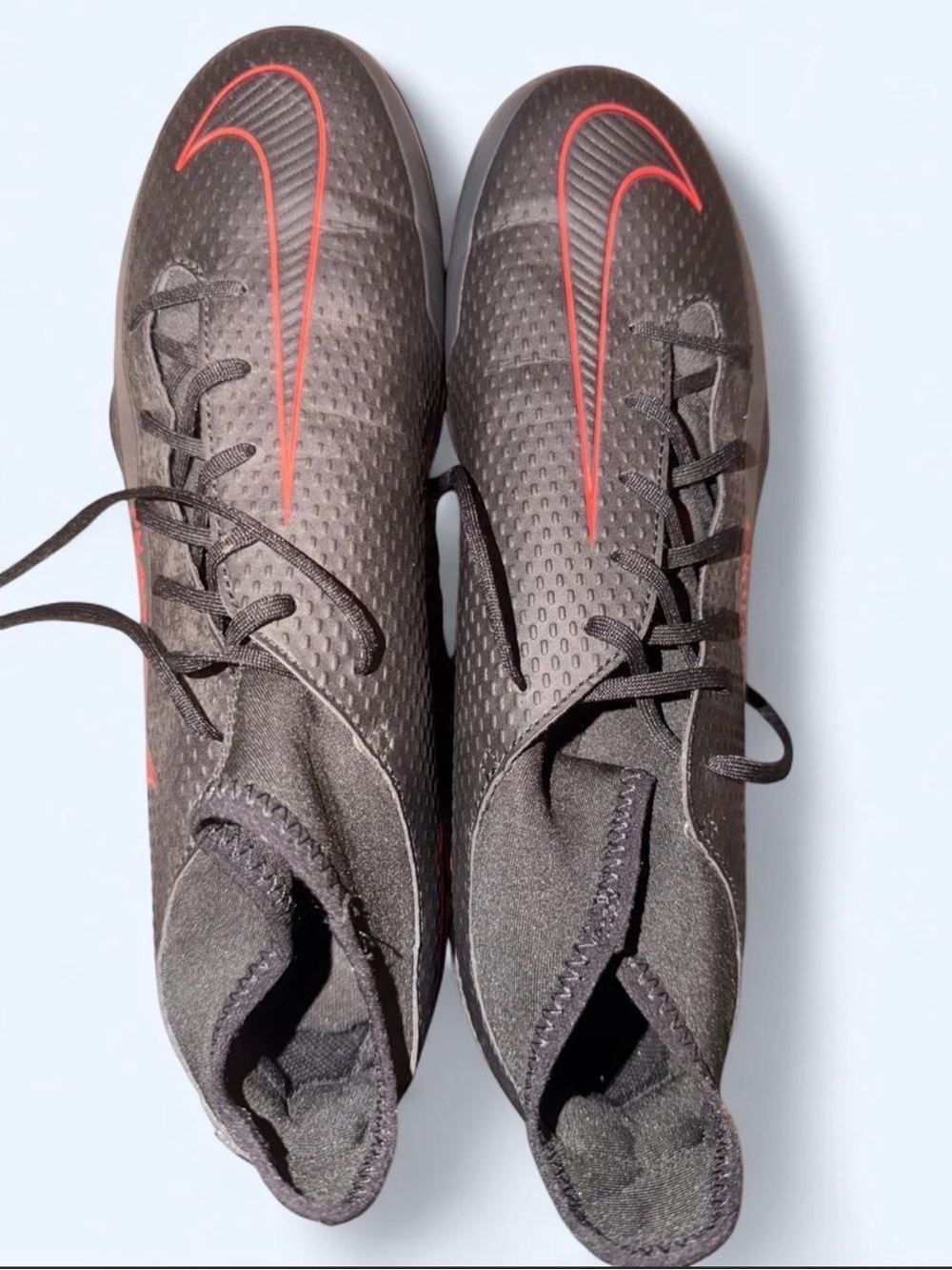 Nike Women’s Black Soccer Cleats with Red Swoosh